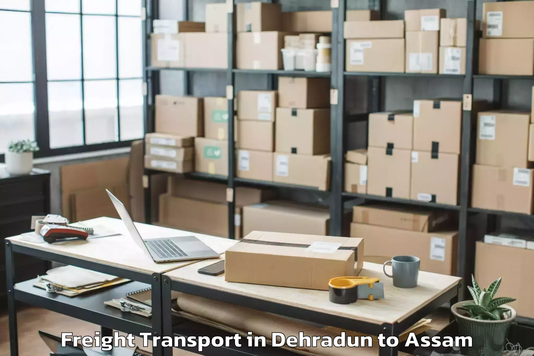 Book Dehradun to Dhekiajuli Freight Transport Online